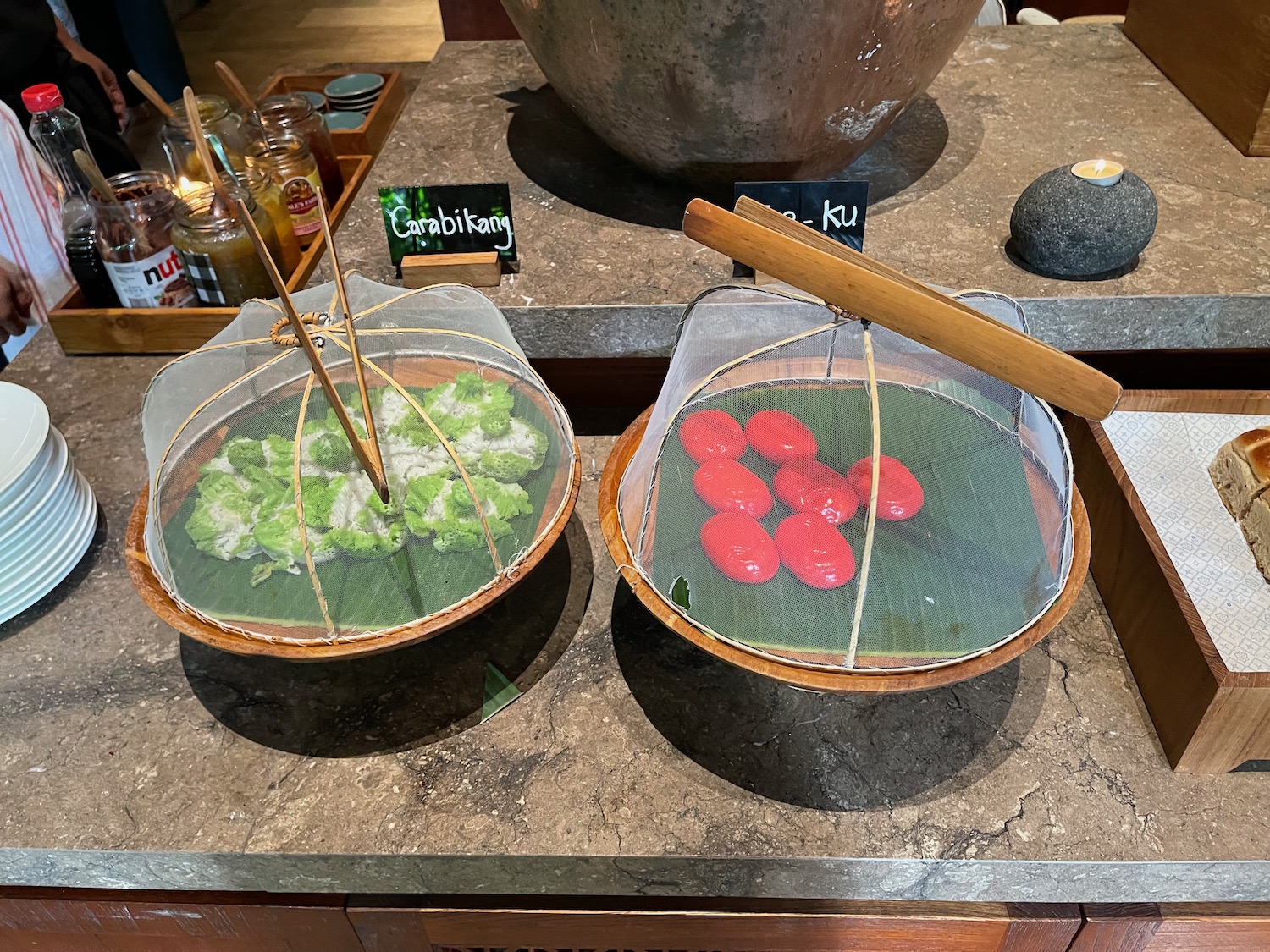 food on a counter with a bowl of food