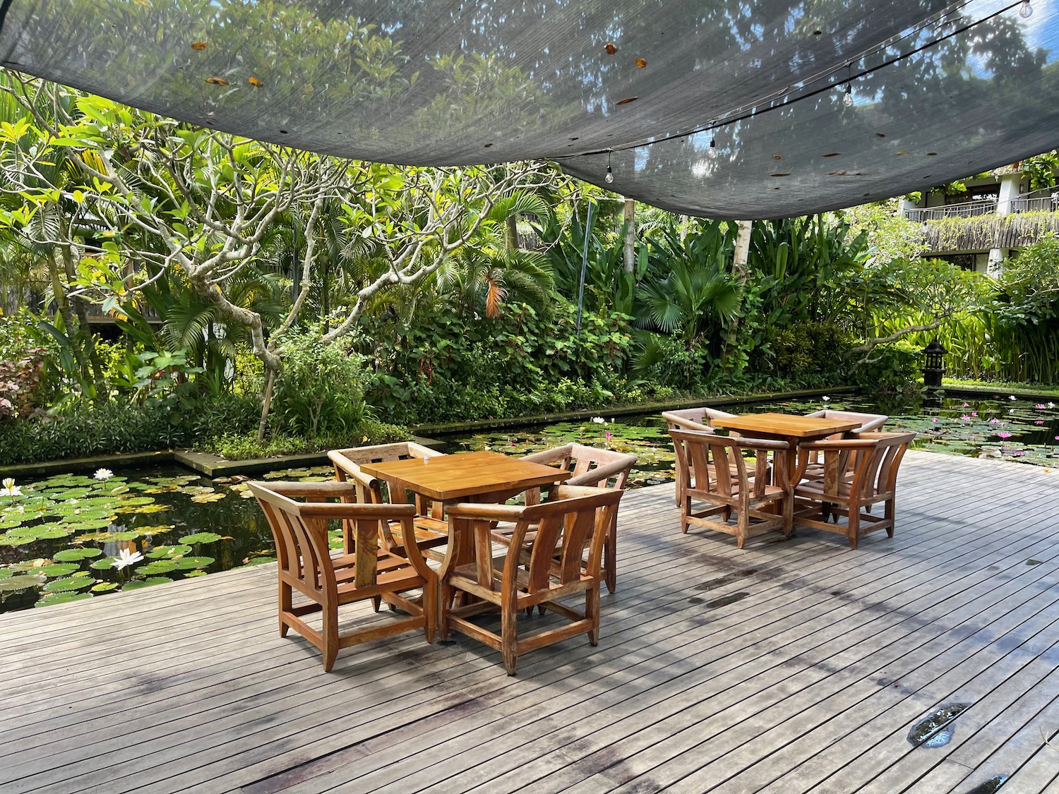 a table and chairs on a deck