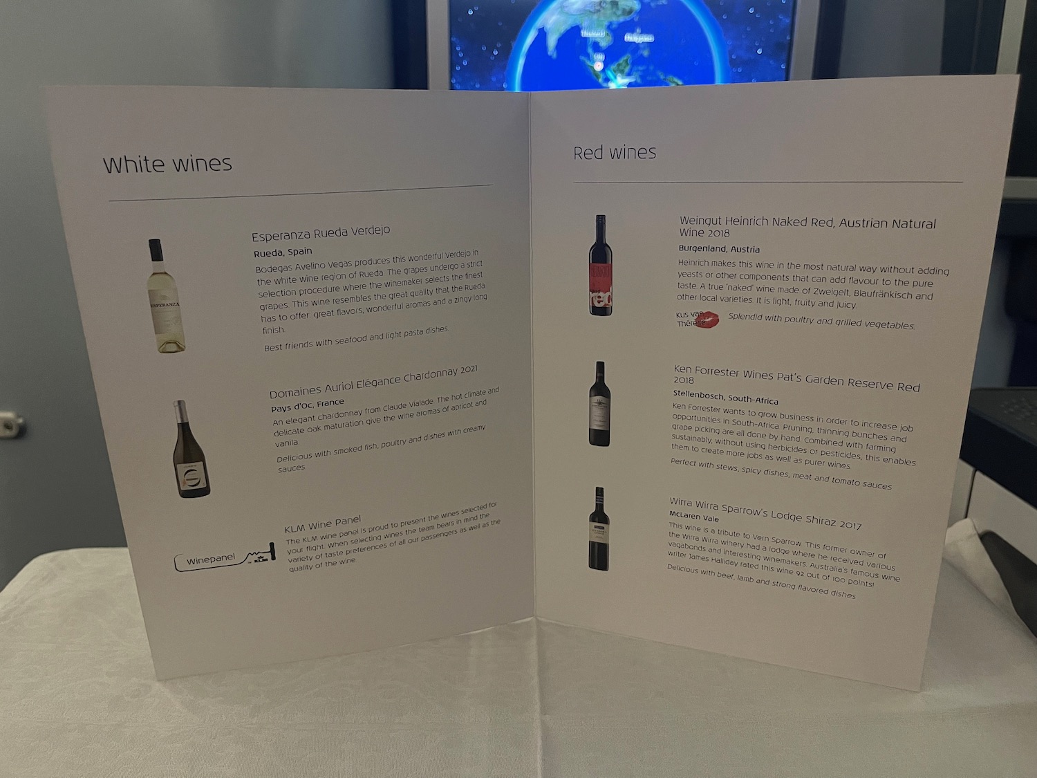 a menu with a picture of wine bottles