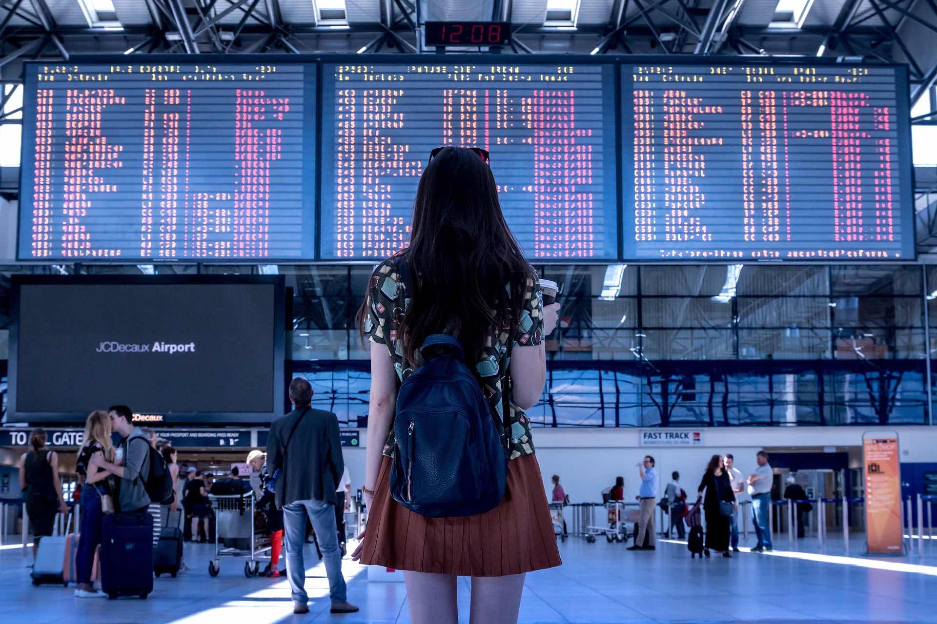 a woman looking at a digital screen