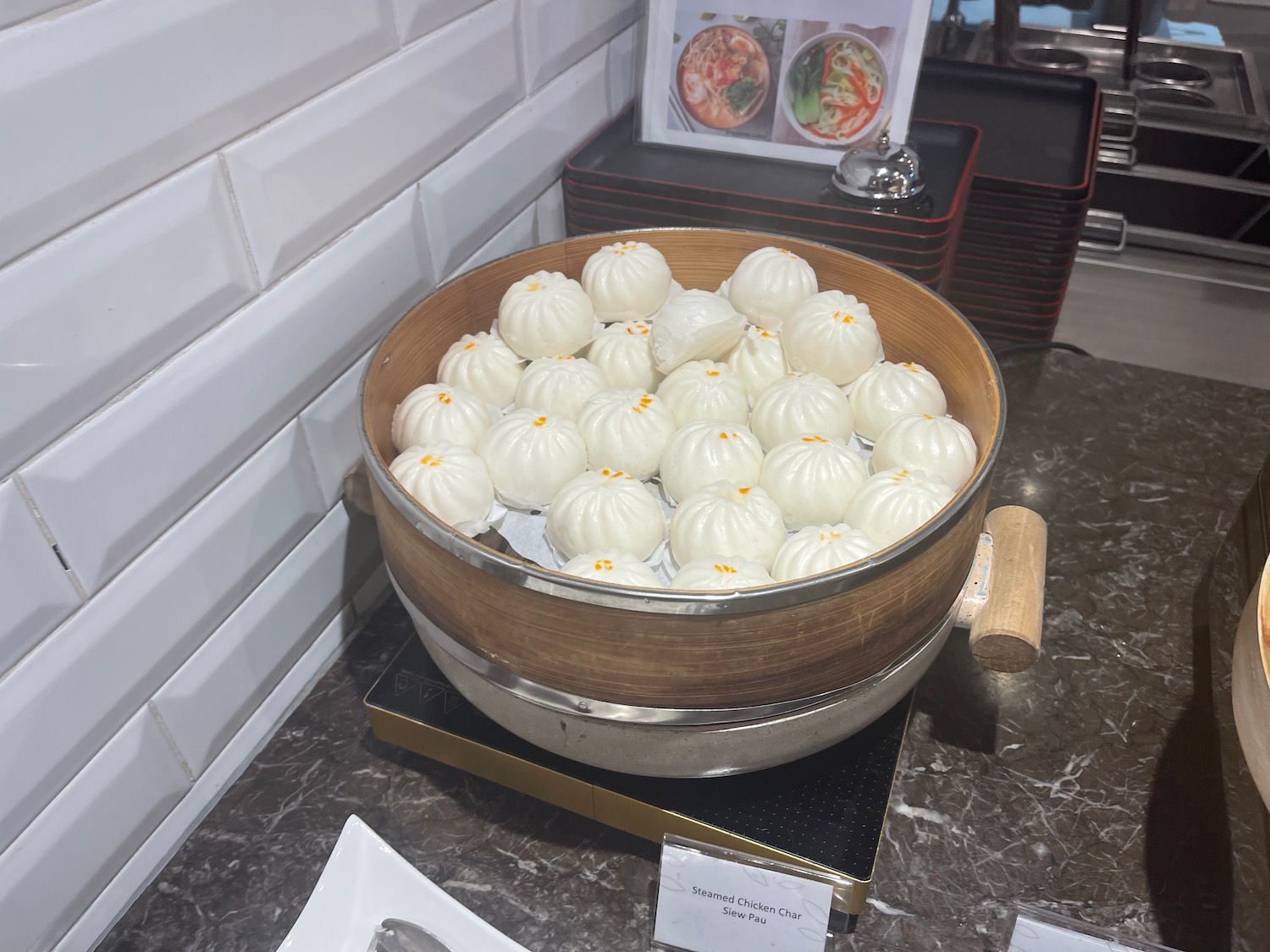 a bowl of dumplings on a counter
