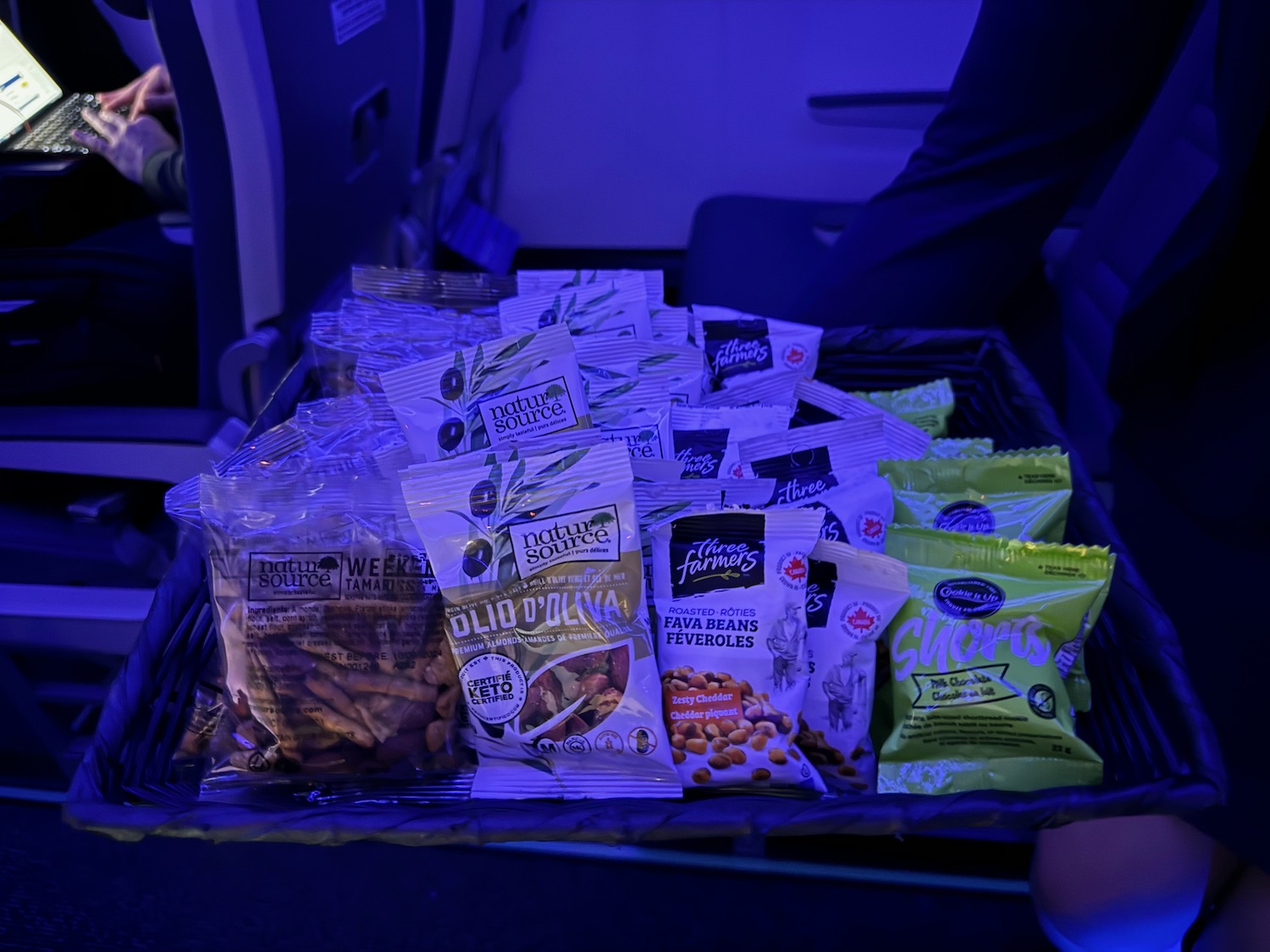 a tray of snacks on an airplane