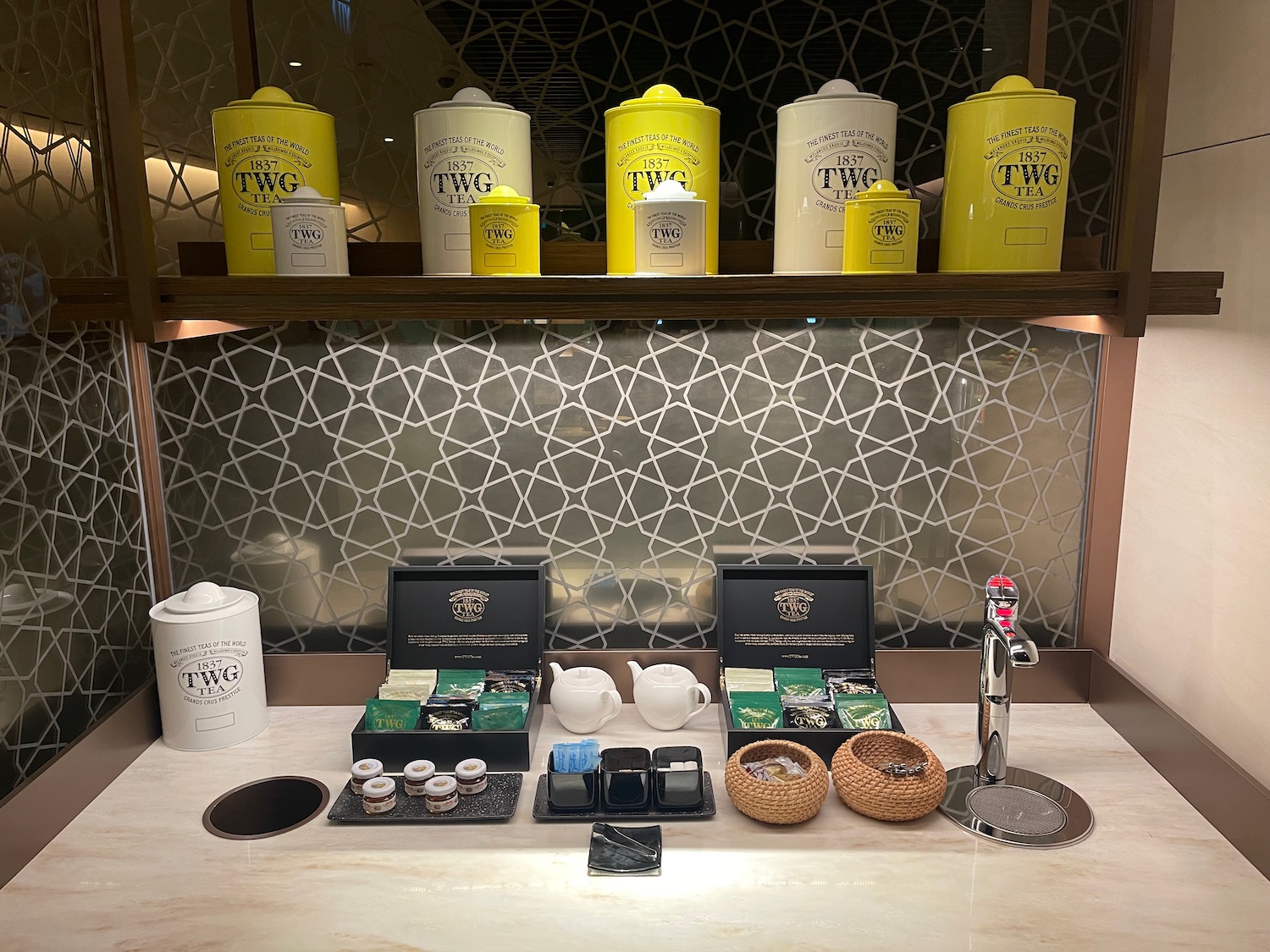 a counter with a variety of tea items