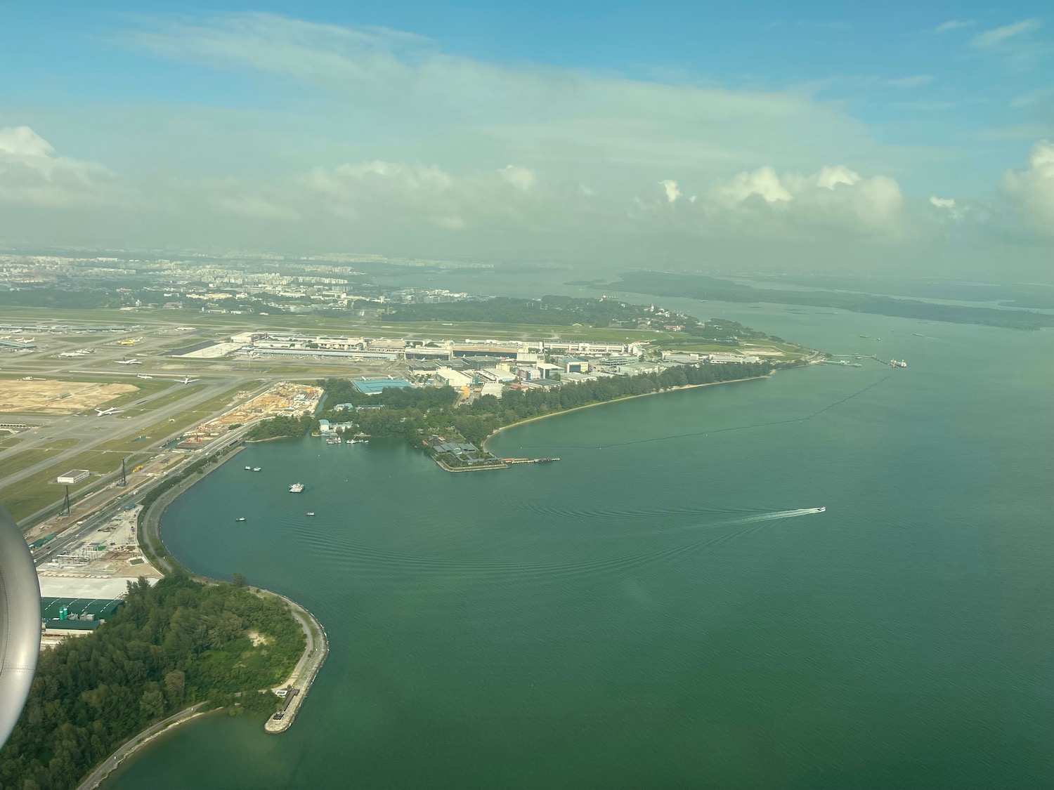 an aerial view of a body of water and a city