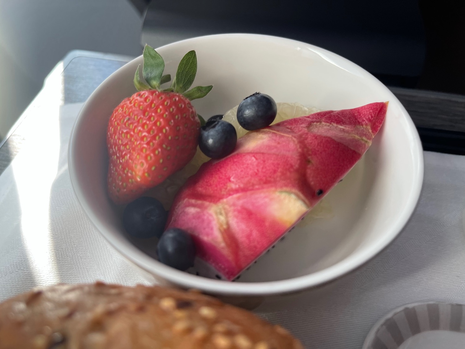 a bowl of fruit and berry