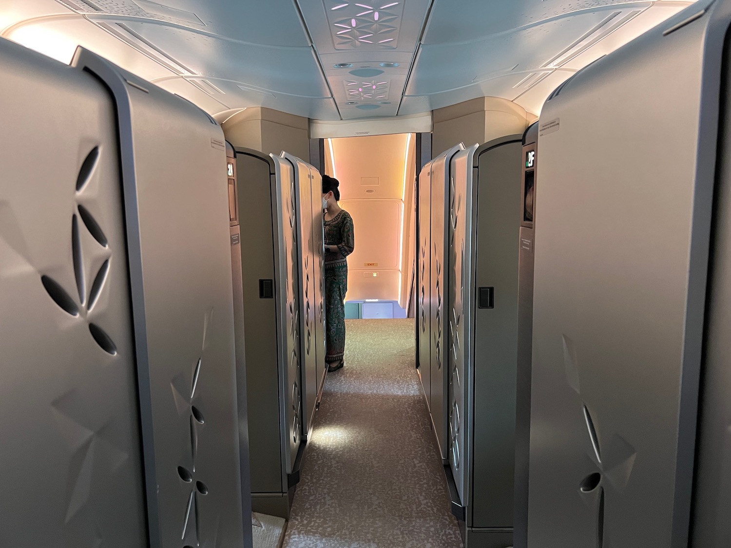 a person standing in a row of lockers