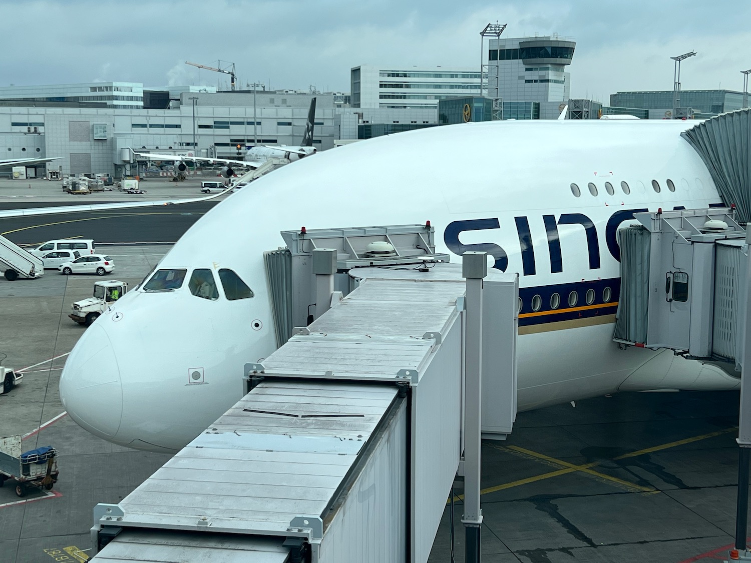 a white airplane at an airport