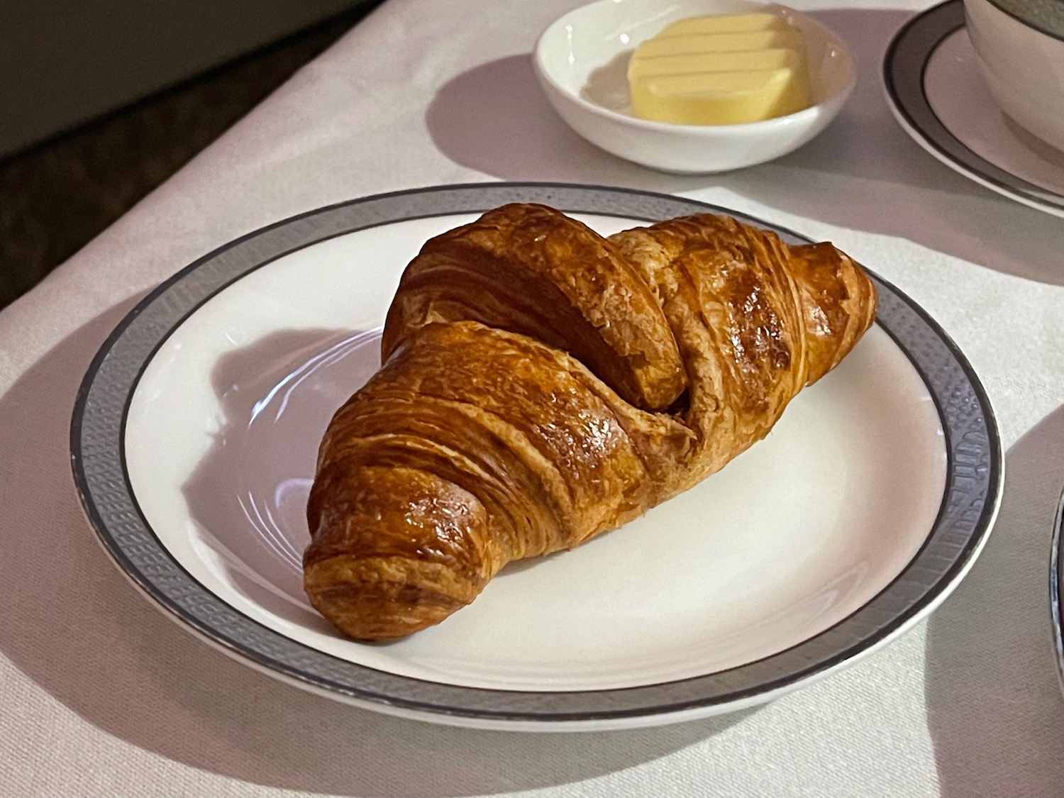 a croissant on a plate