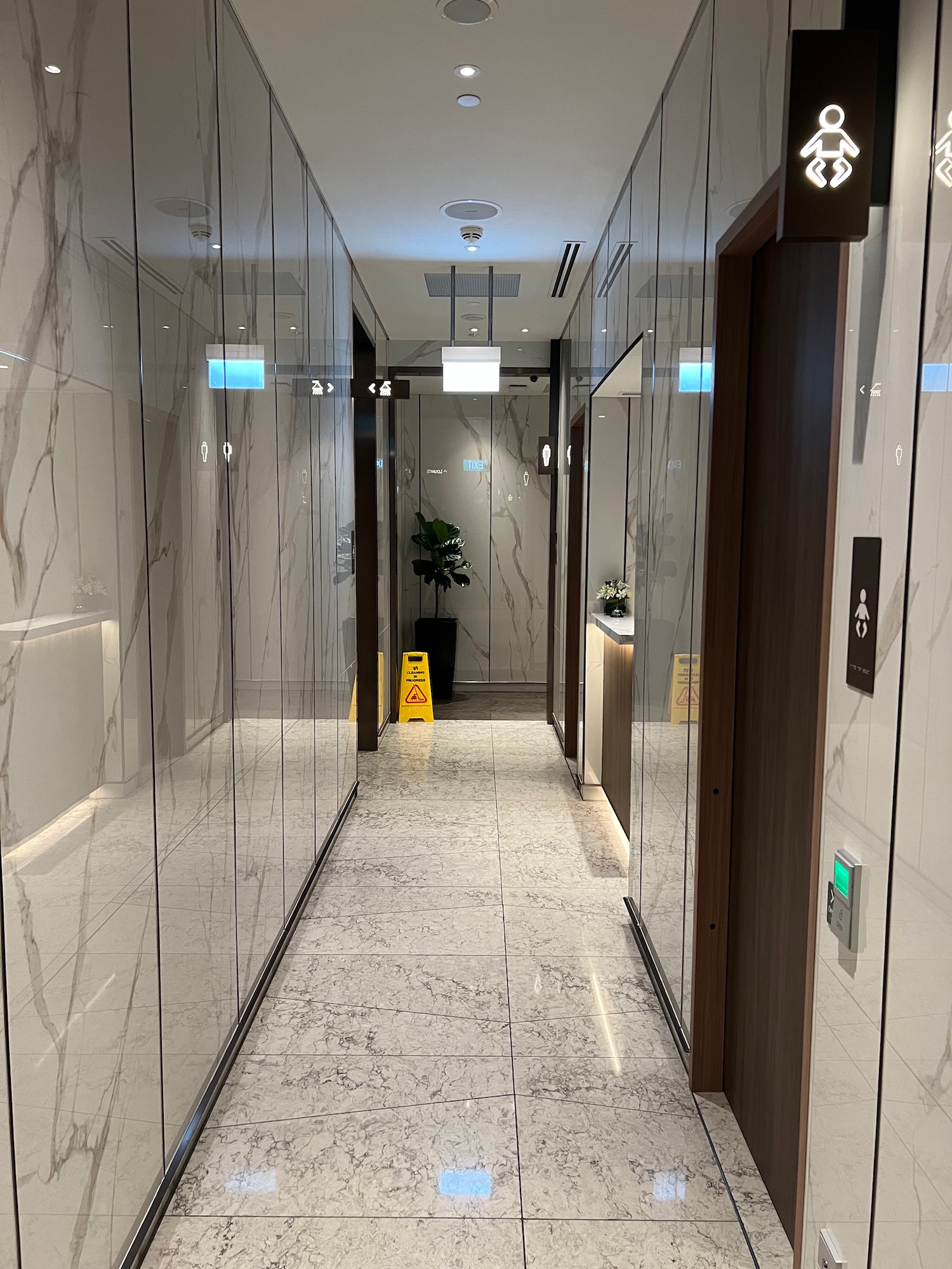 a hallway with glass walls