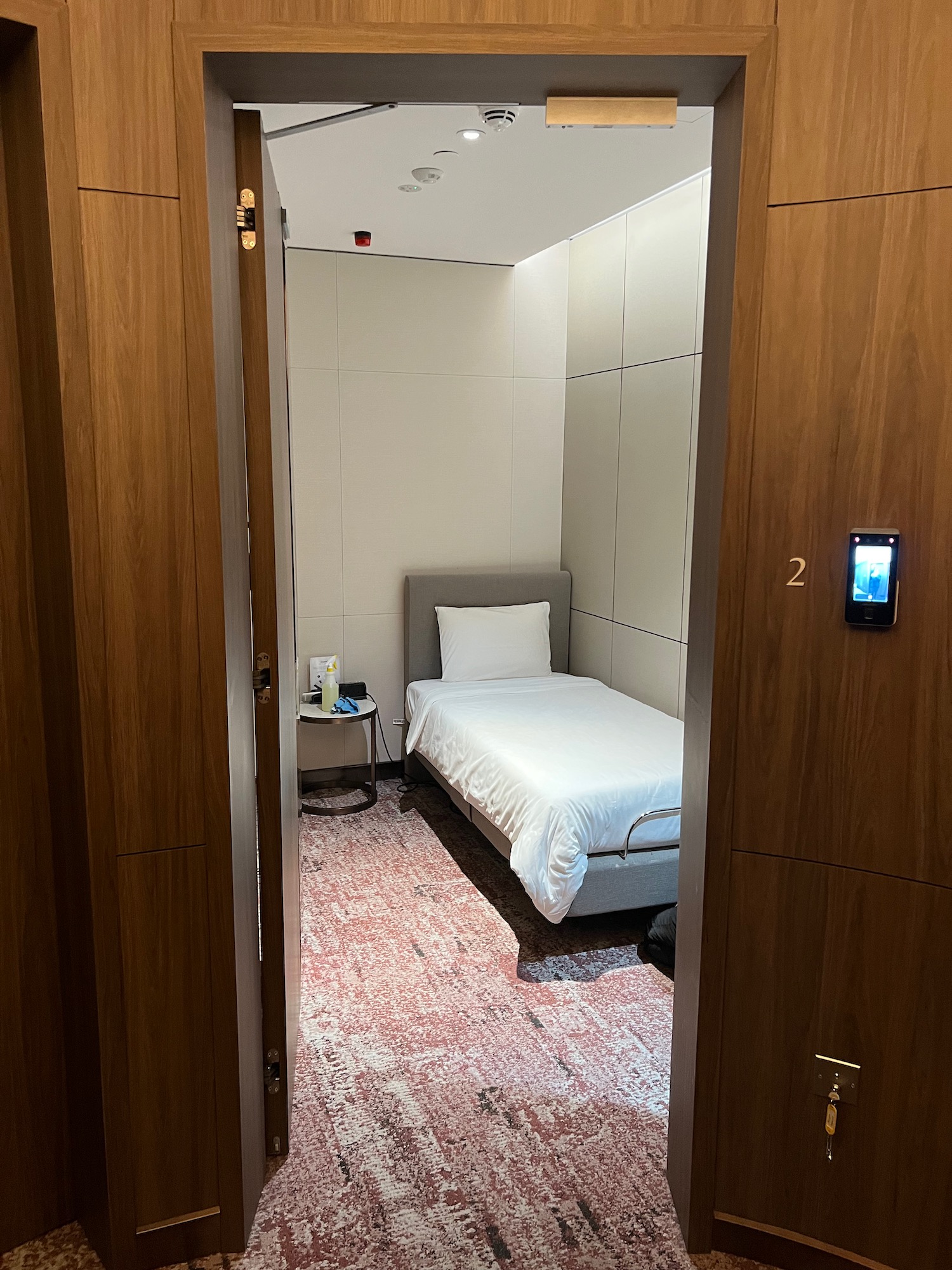 a room with a bed and a door