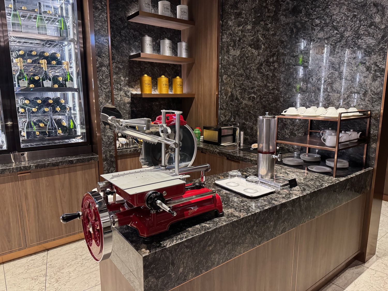 a red machine on a counter