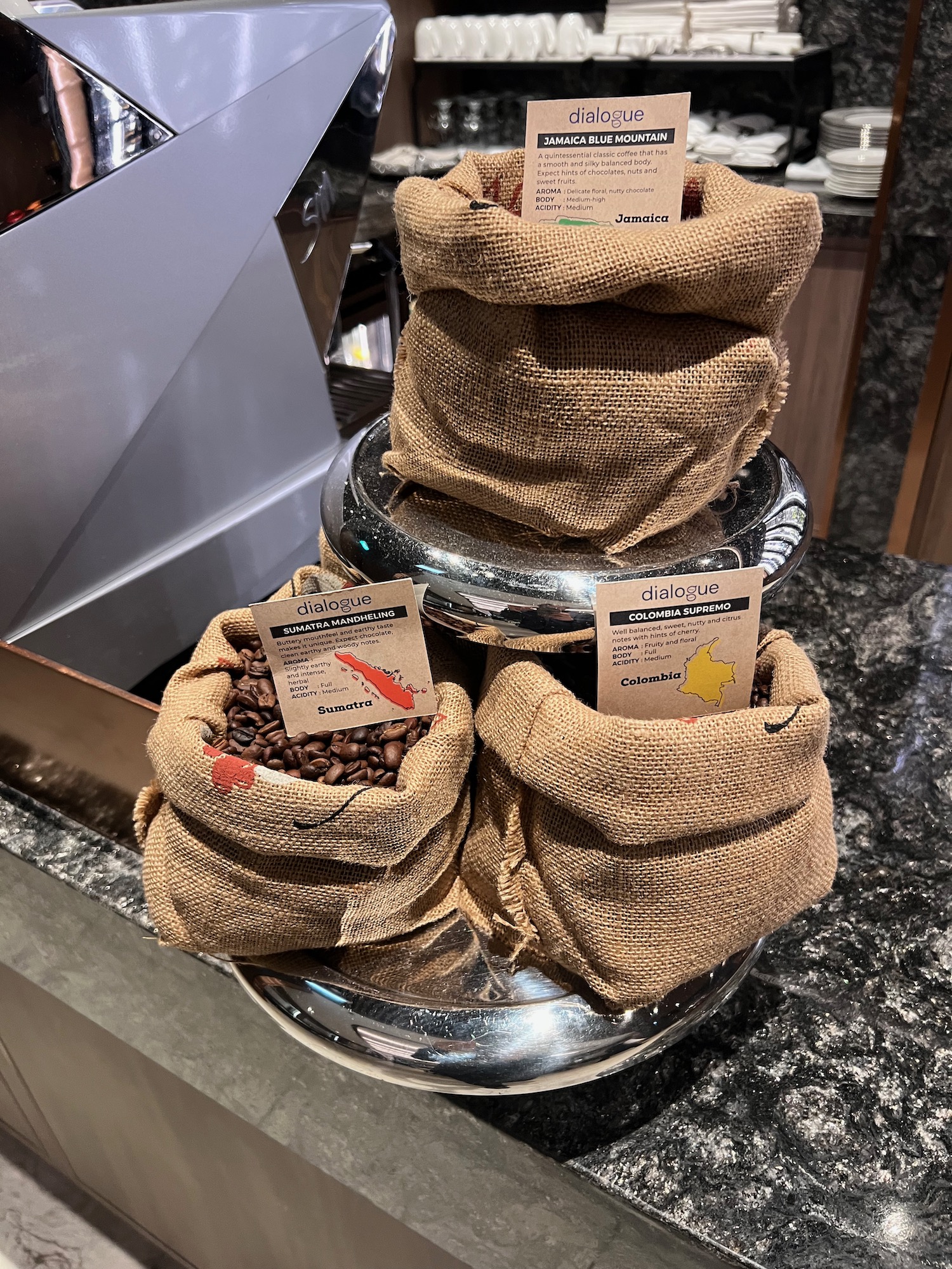 a group of burlap sacks with coffee beans