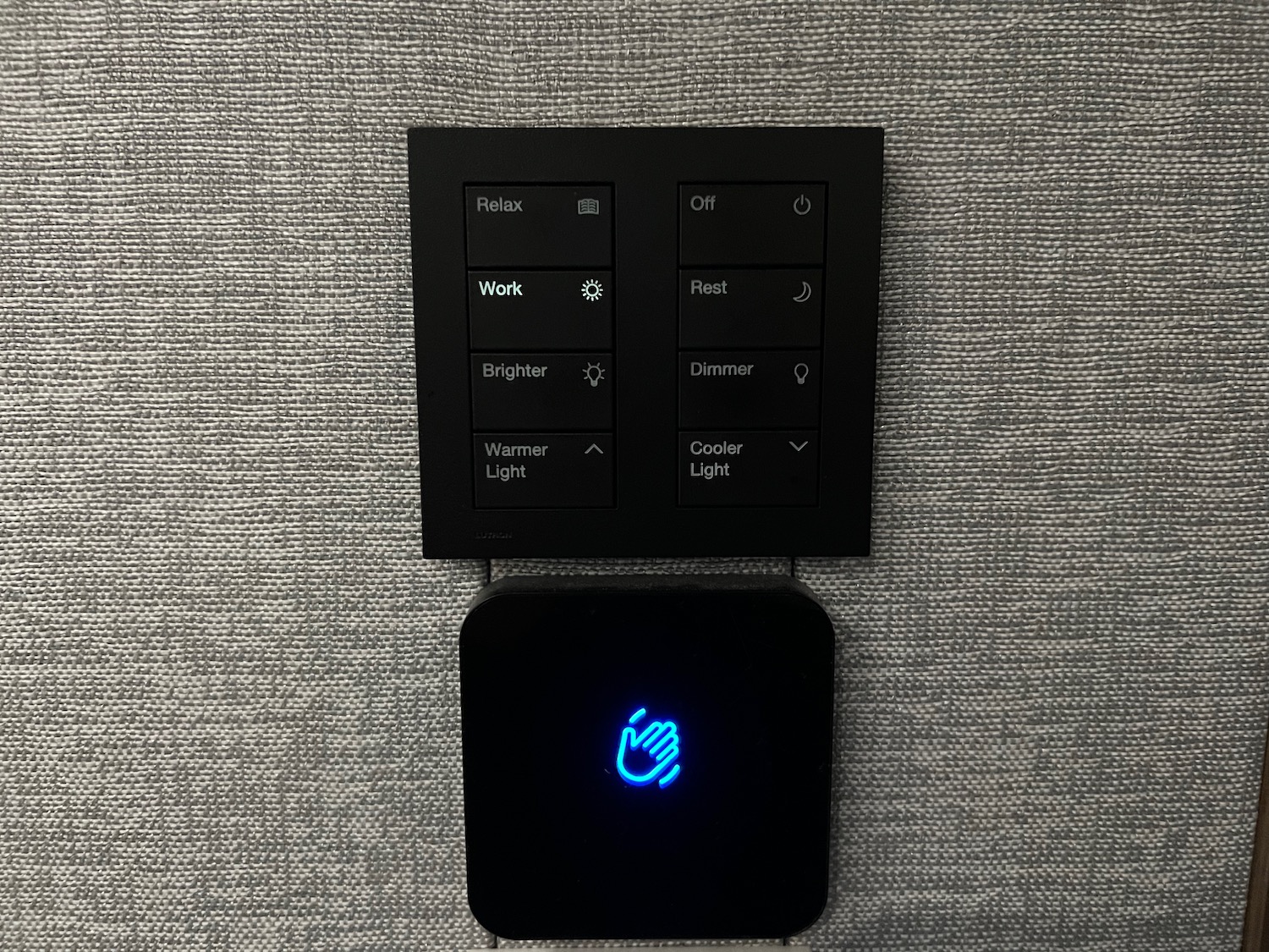 a black square with a blue light on it
