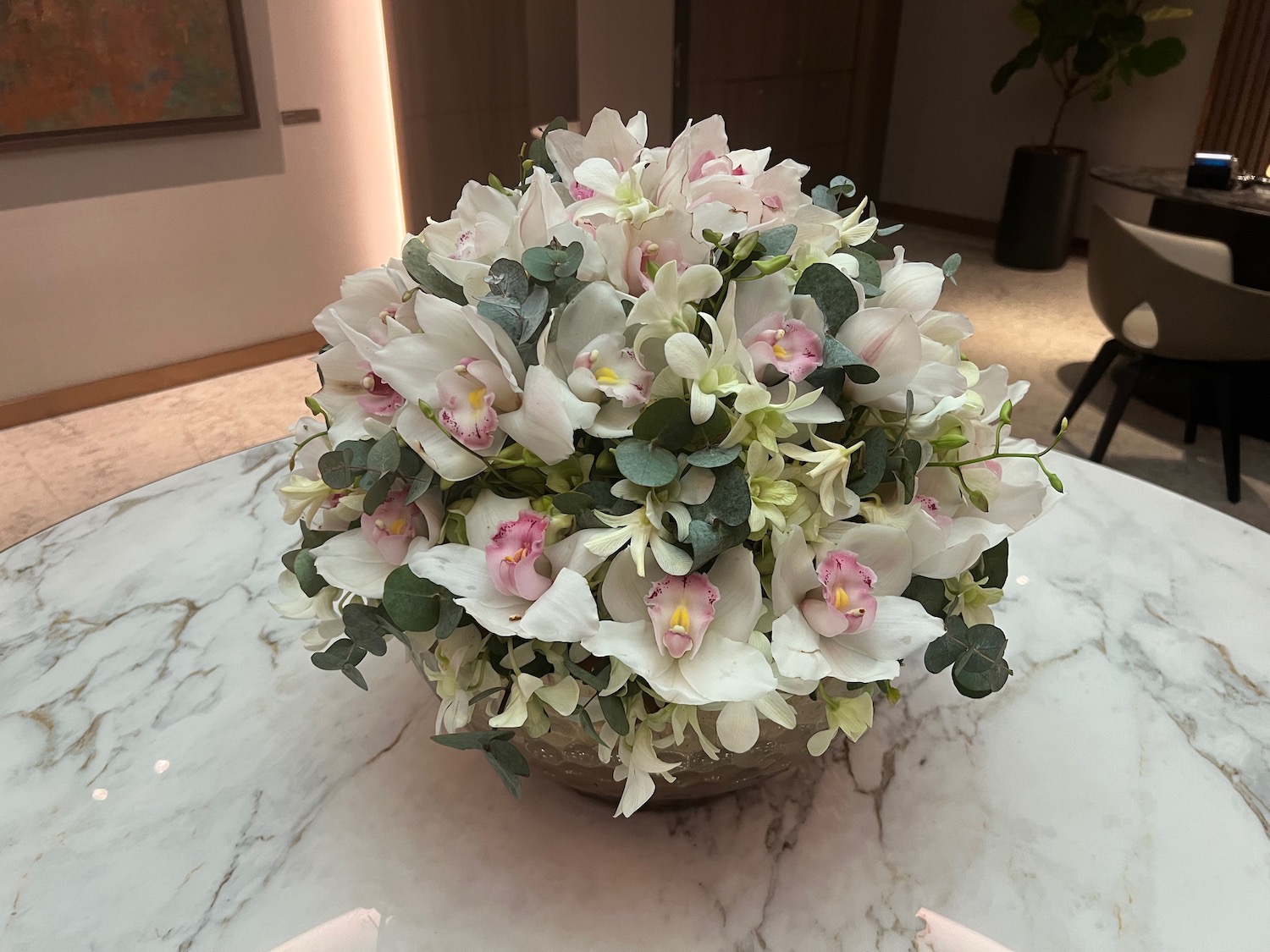 a bouquet of flowers on a marble table