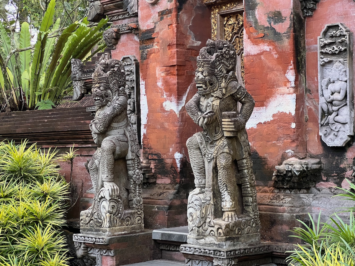 statues outside a building