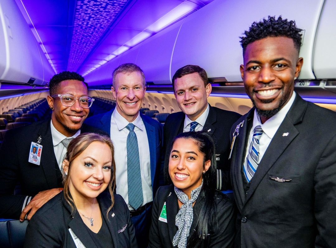 a group of people posing for a photo