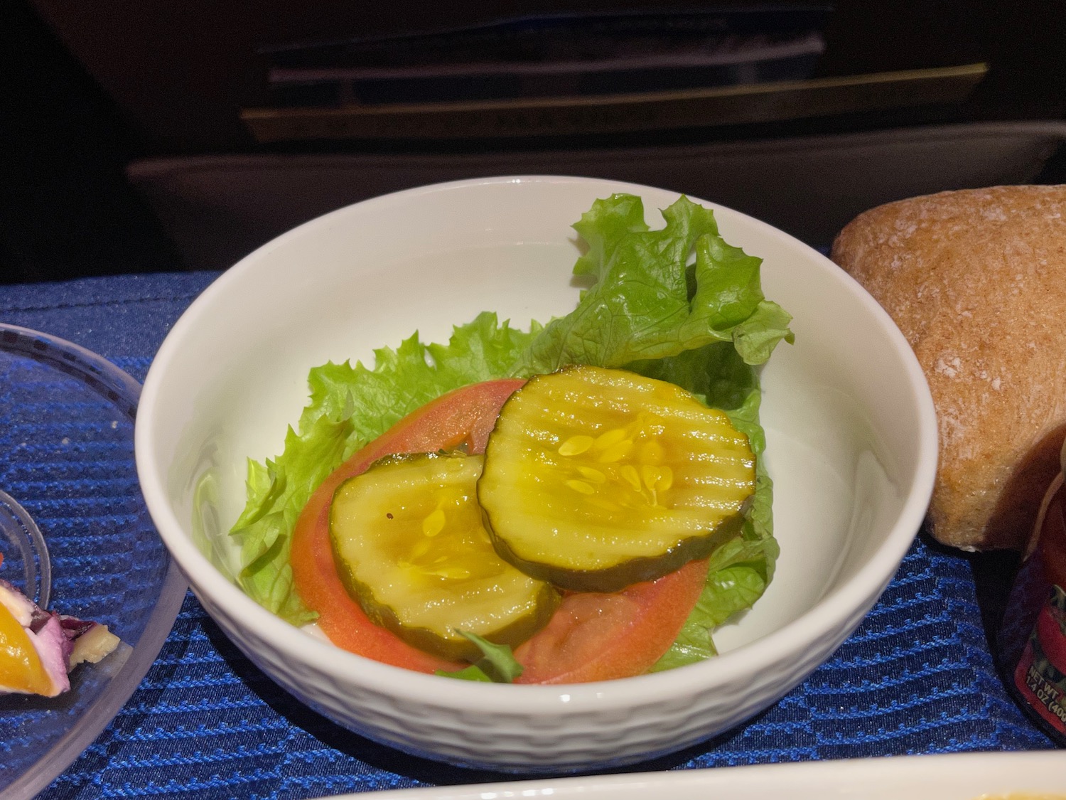 a bowl of food on a blue place mat