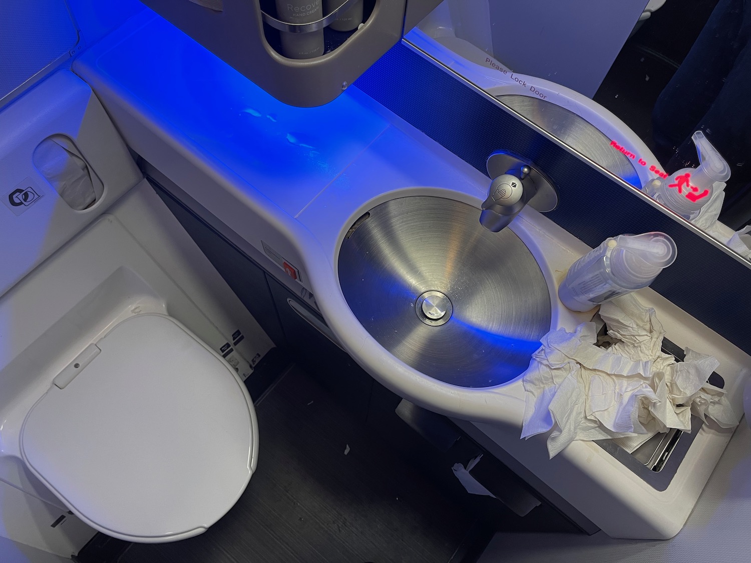 a sink and toilet in a plane