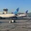 airplanes parked at an airport