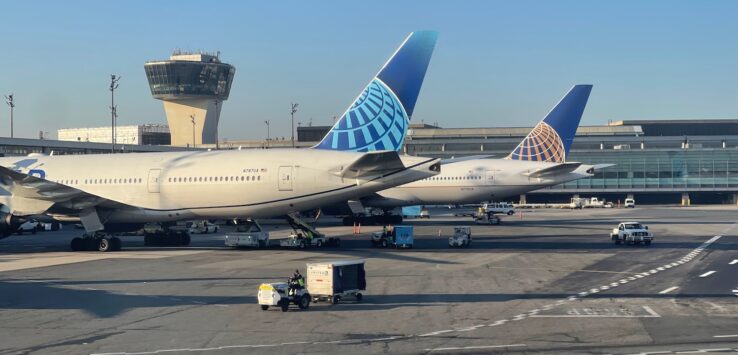 airplanes parked at an airport