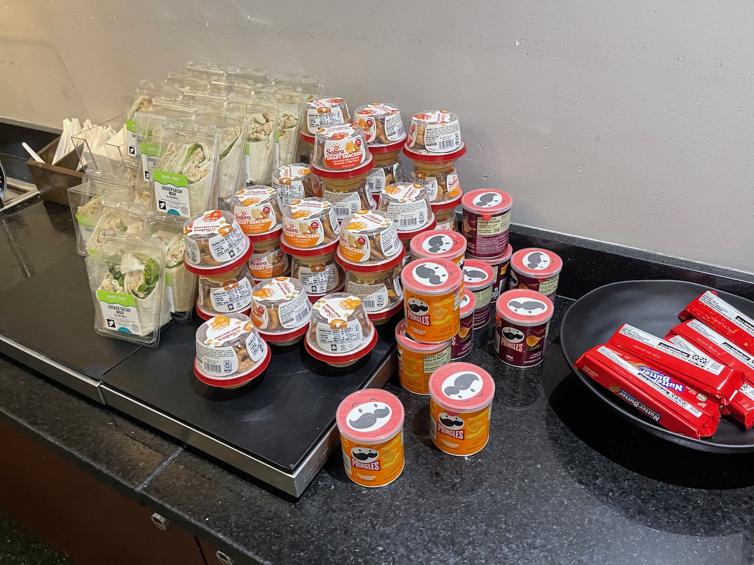 a group of containers of food on a counter