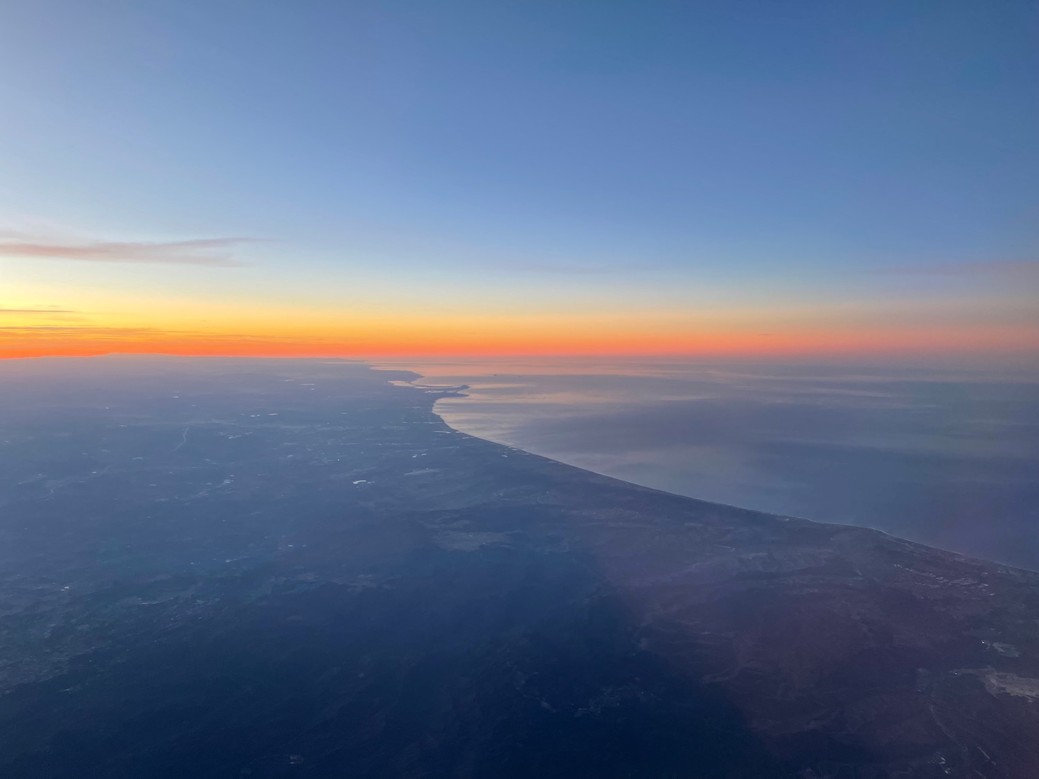 a view of a landscape from an airplane