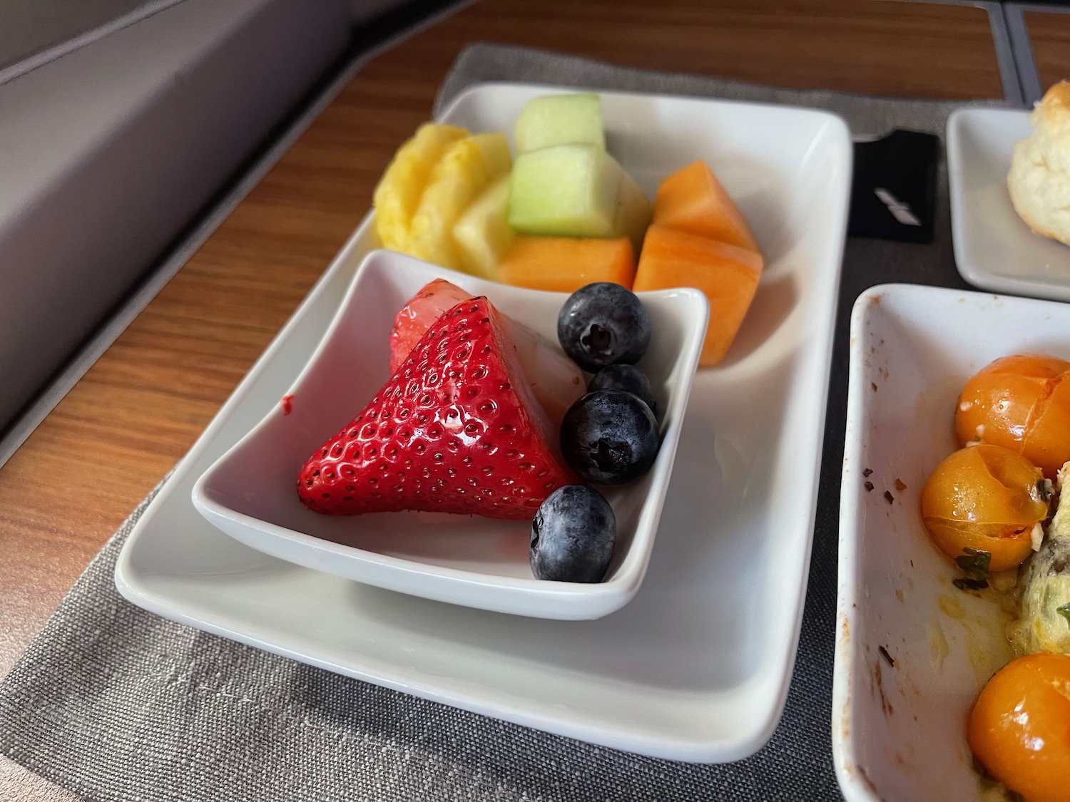 a plate of fruit on a table