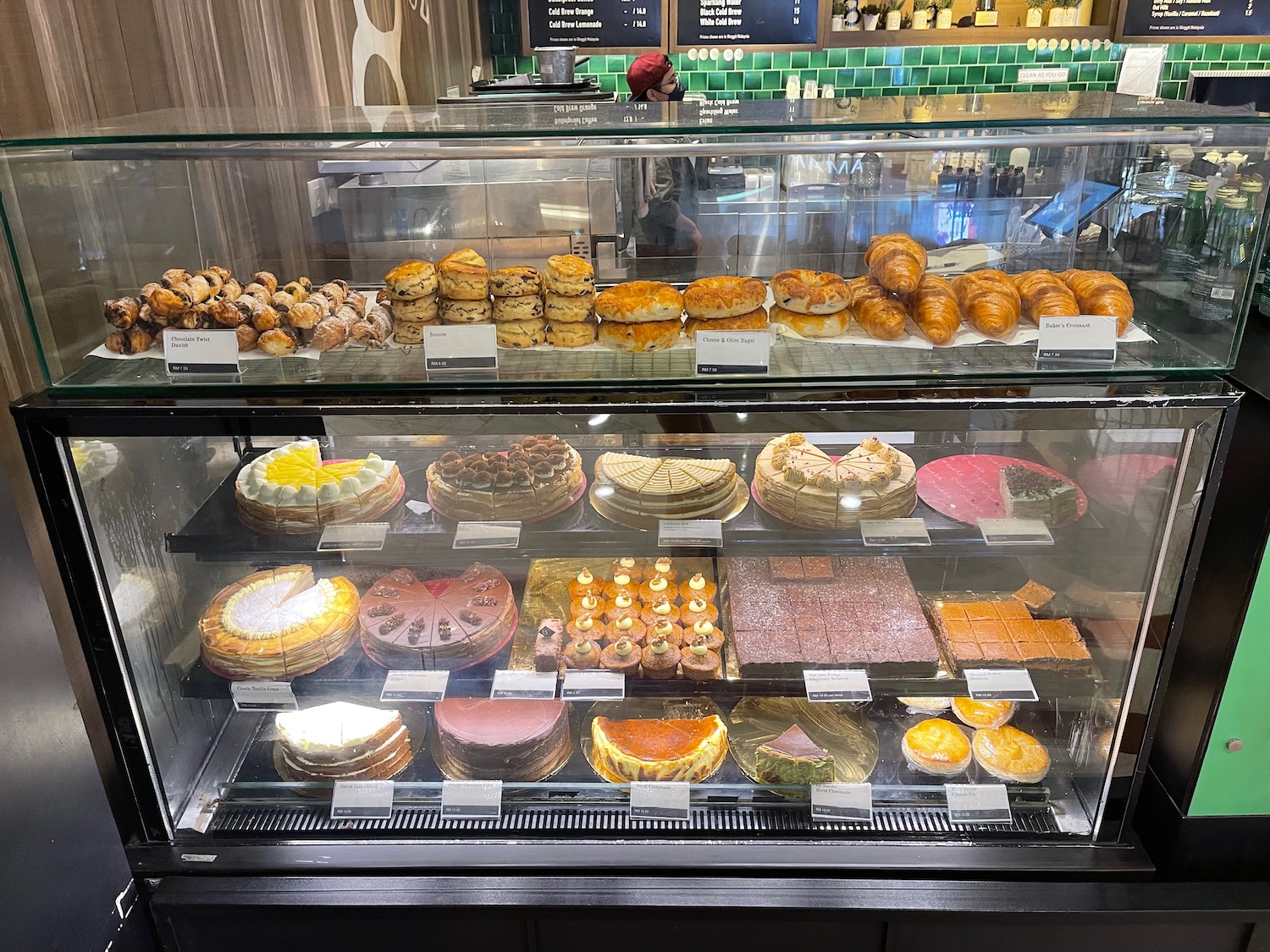 a display case with pastries and pastries