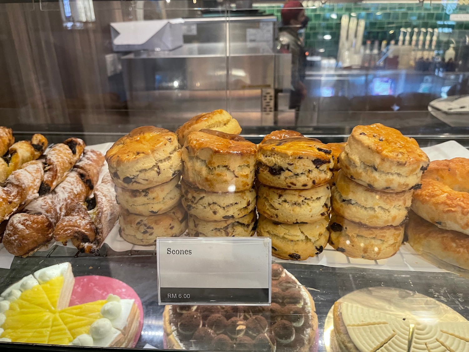 a display case with pastries