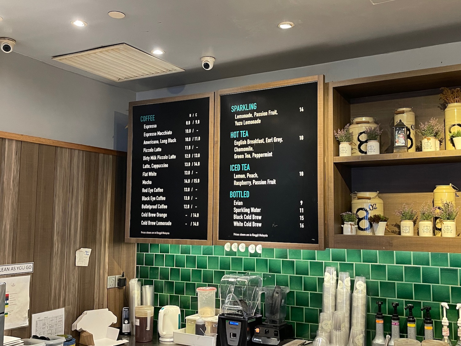 a menu board in a coffee shop