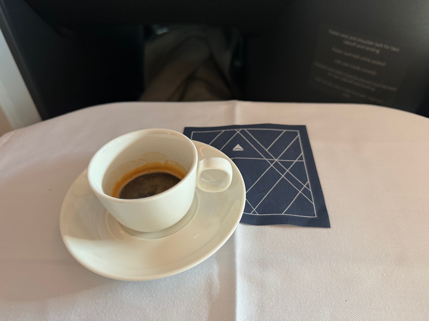 a cup of coffee on a saucer