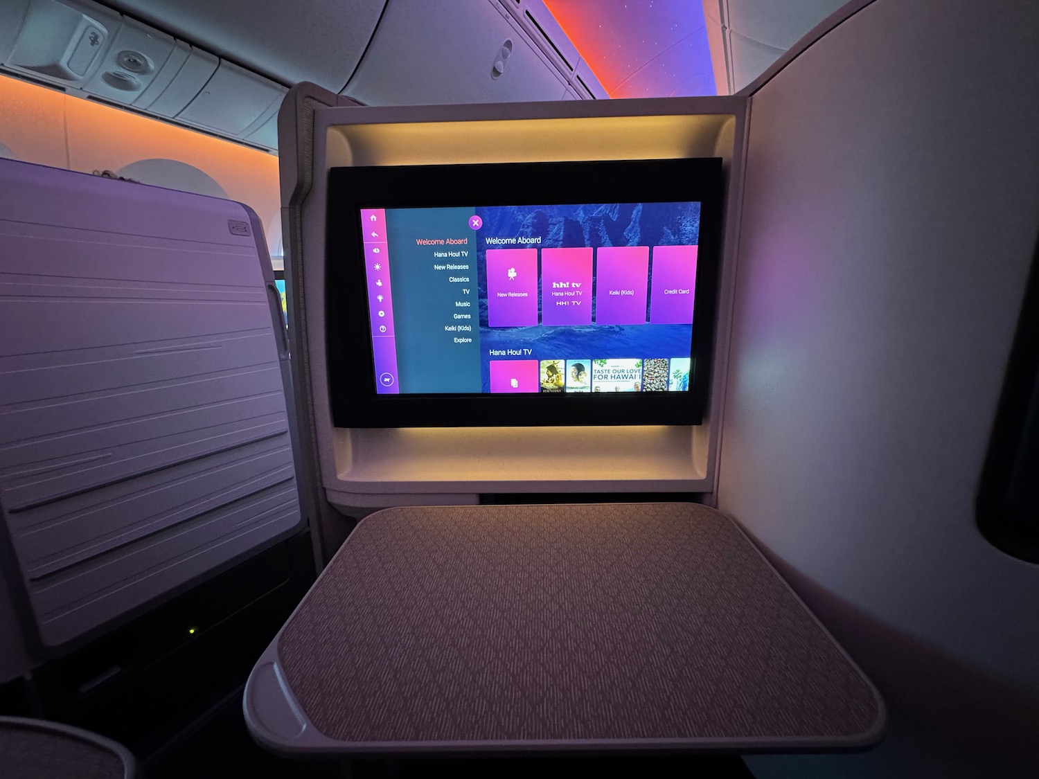 a tv on a seat in an airplane