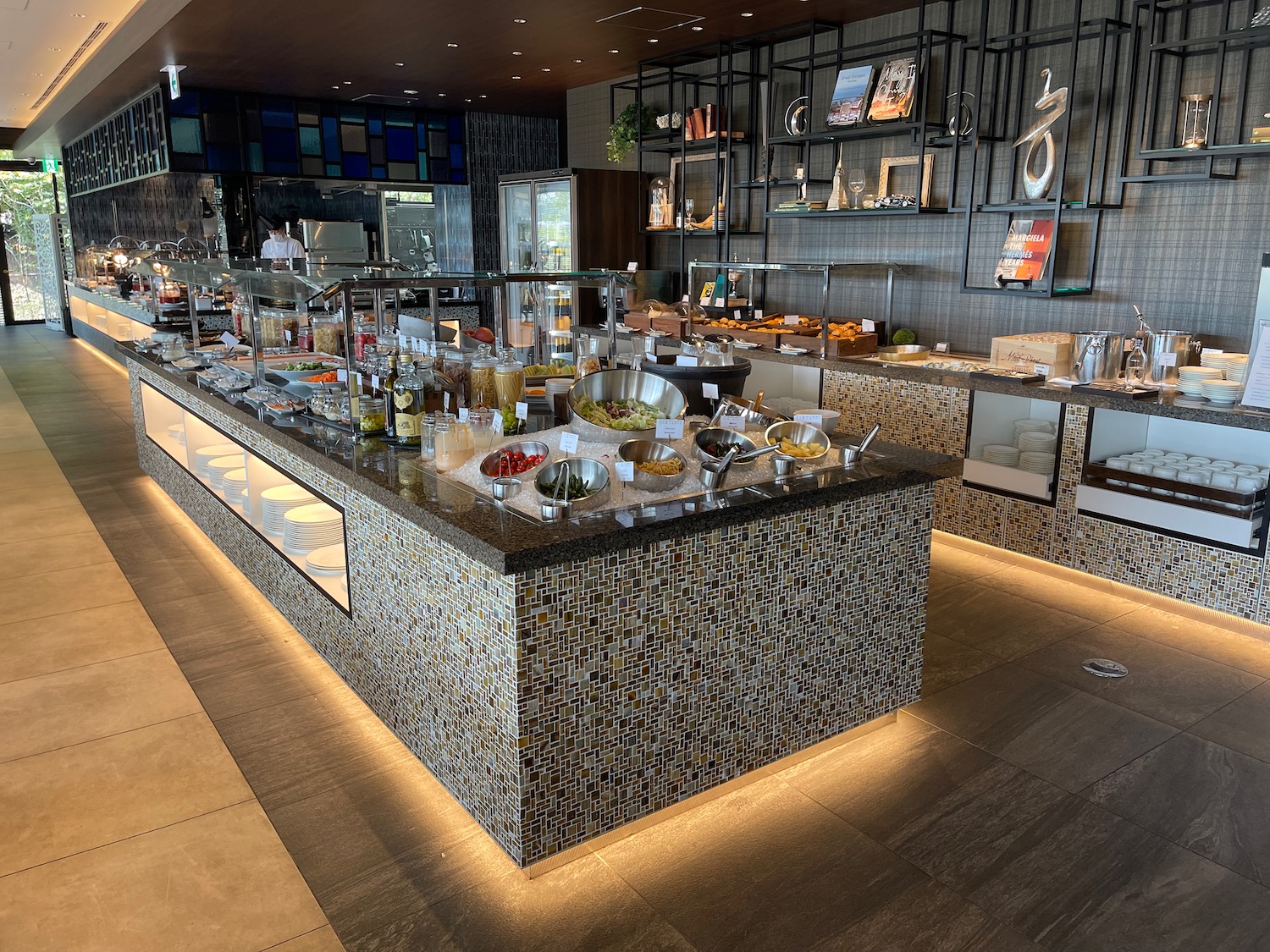 a buffet line with food on the counter