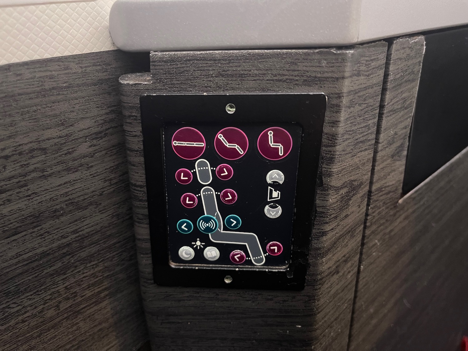 a device with buttons and icons on it