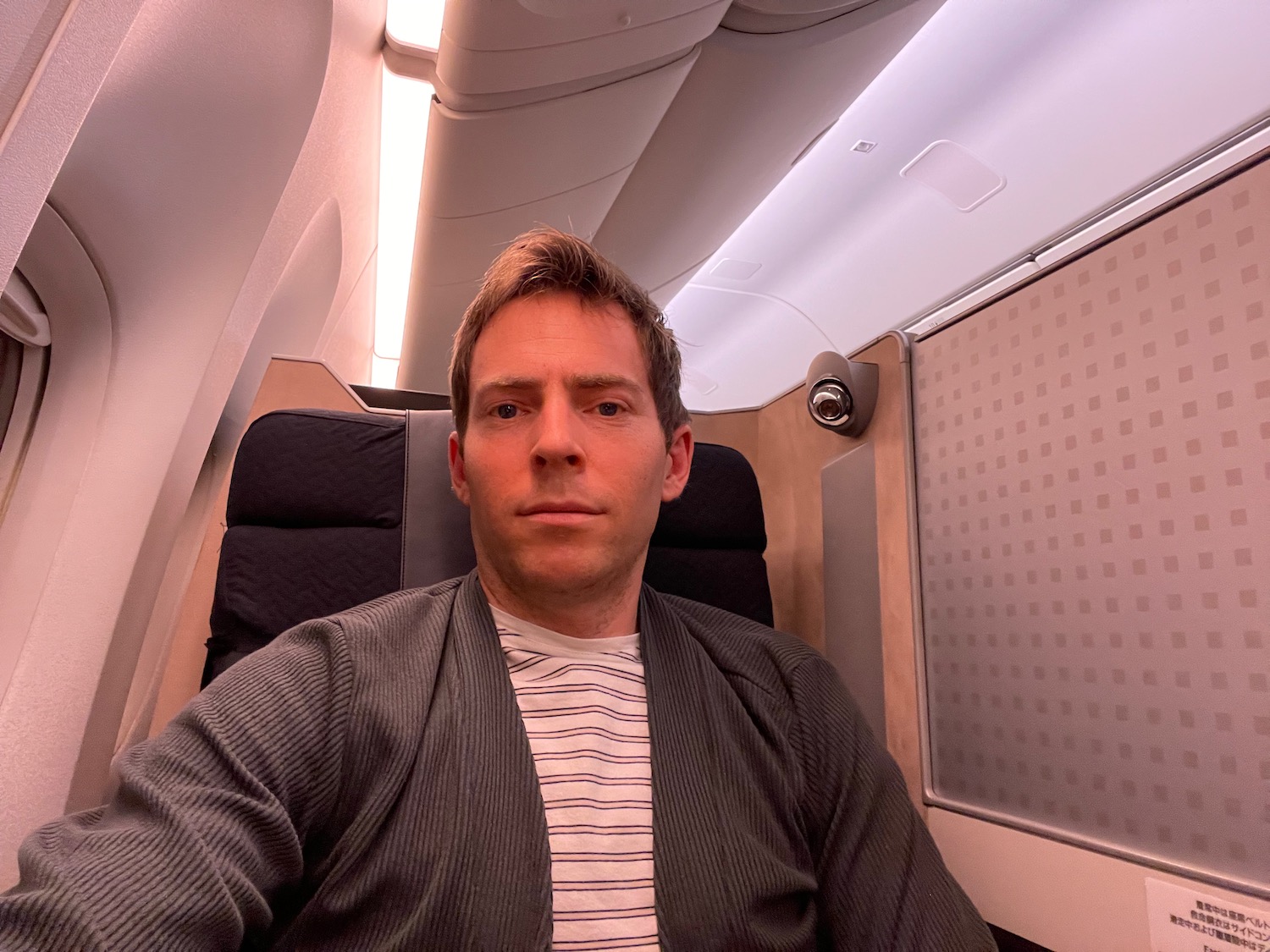 a man sitting in an airplane