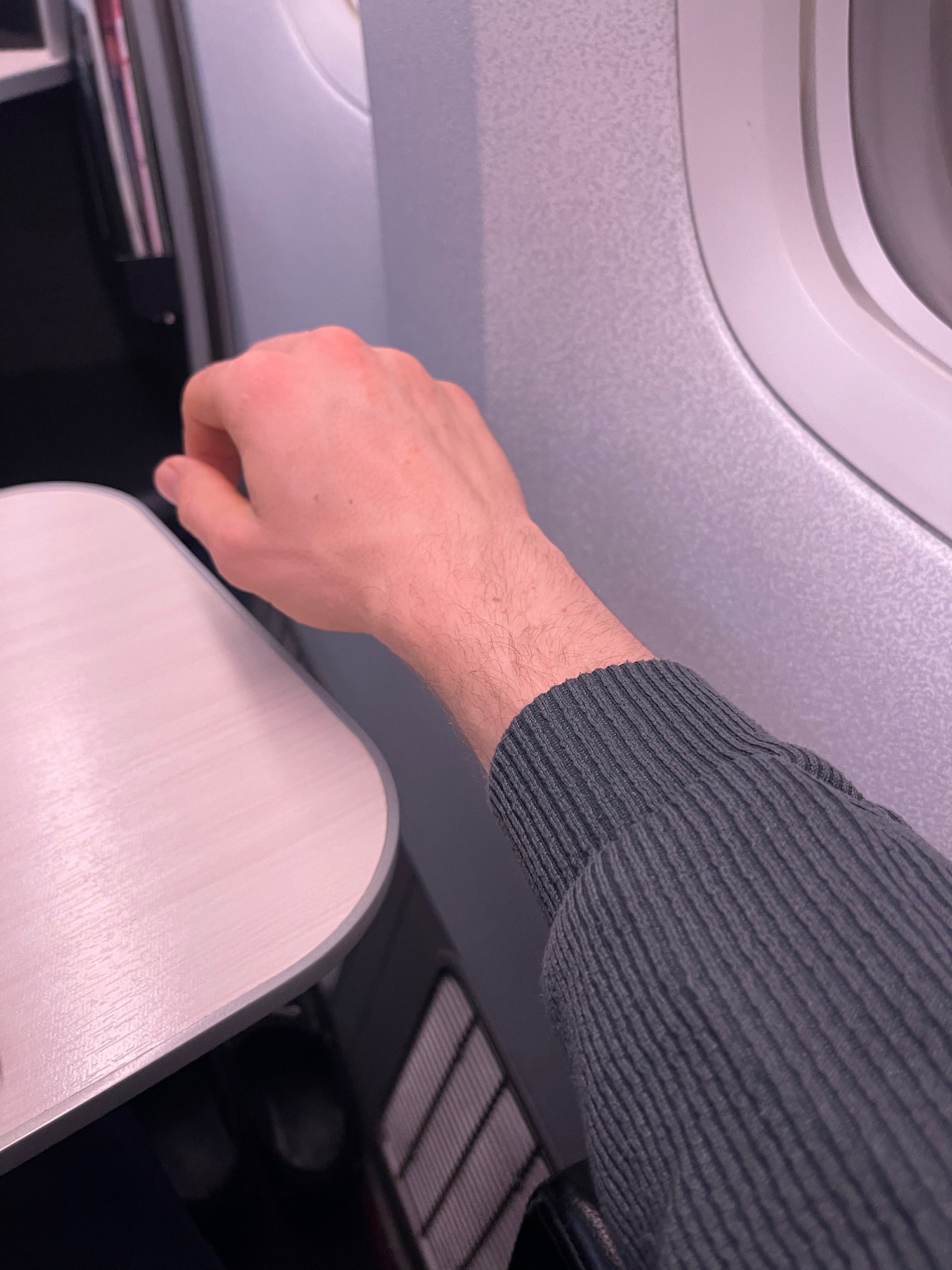 a hand on a plane