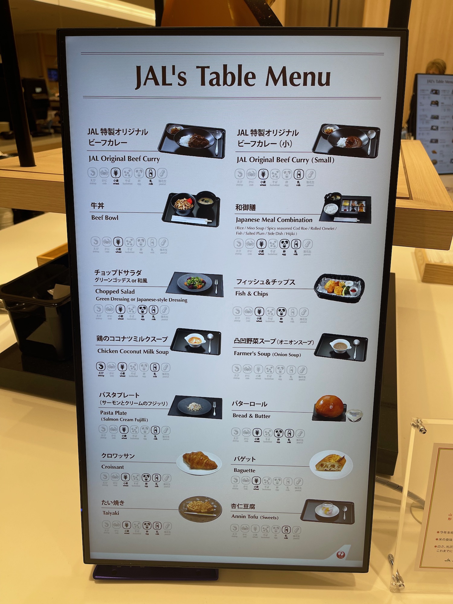 a menu board with food on it