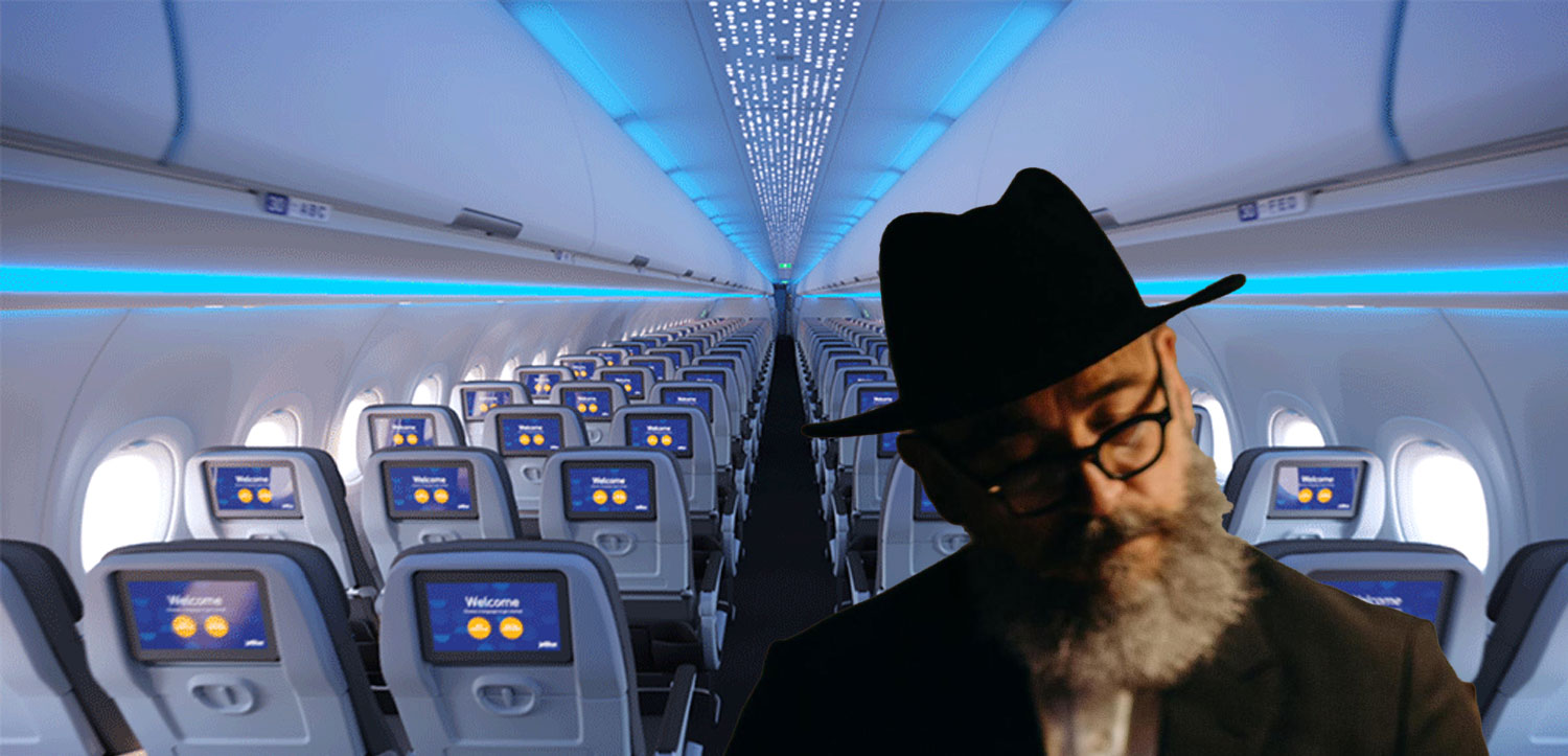 a man in a hat and glasses in an airplane