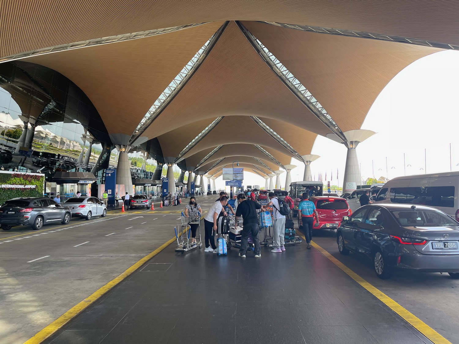 a group of people standing in a terminal