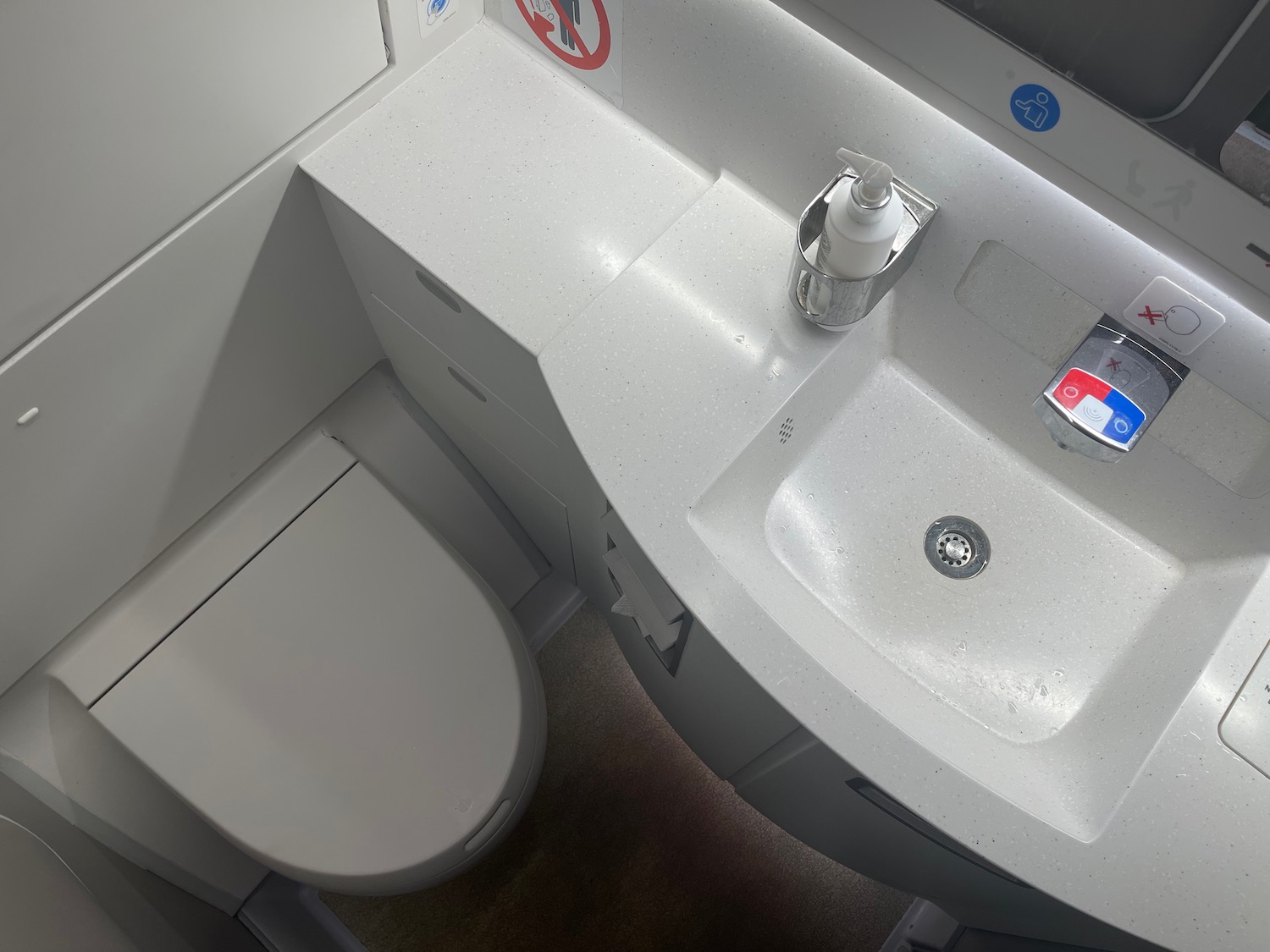 a sink and toilet in a bathroom