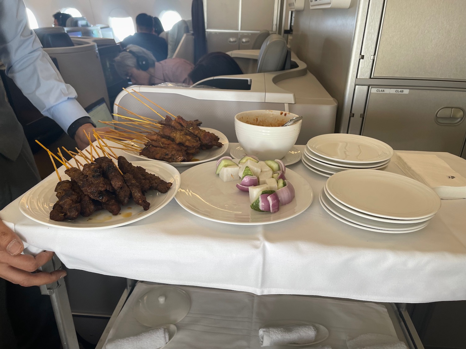 a table with plates of food and plates of food on it