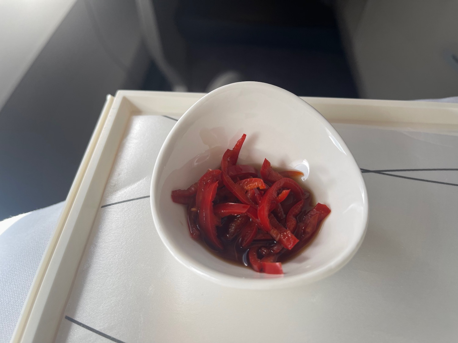 a bowl of red peppers