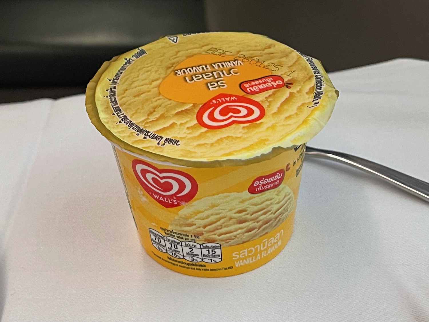 a yellow container of ice cream