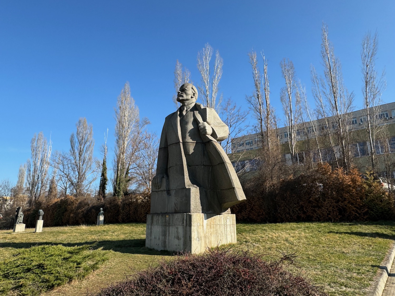 a statue of a man in a park