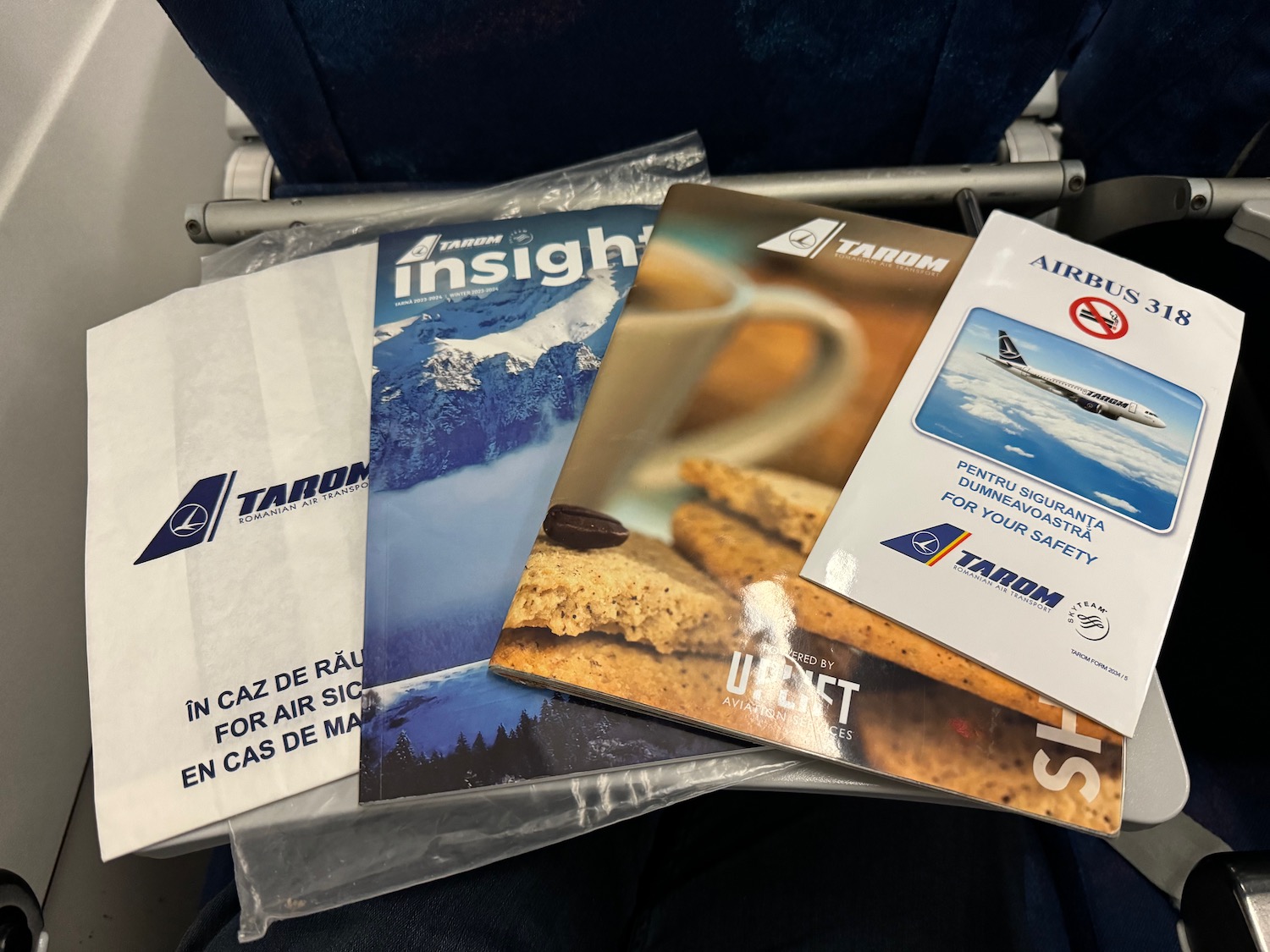 a group of brochures on a seat