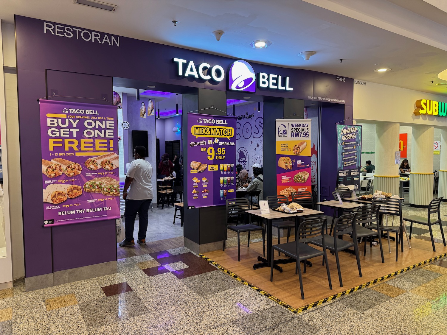 a restaurant with tables and chairs