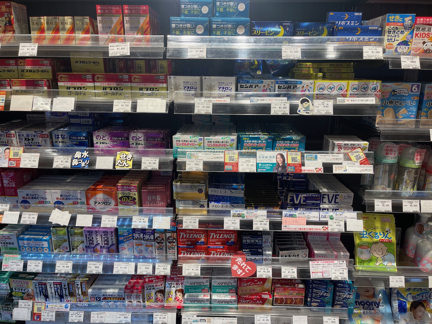 a shelf with boxes on it