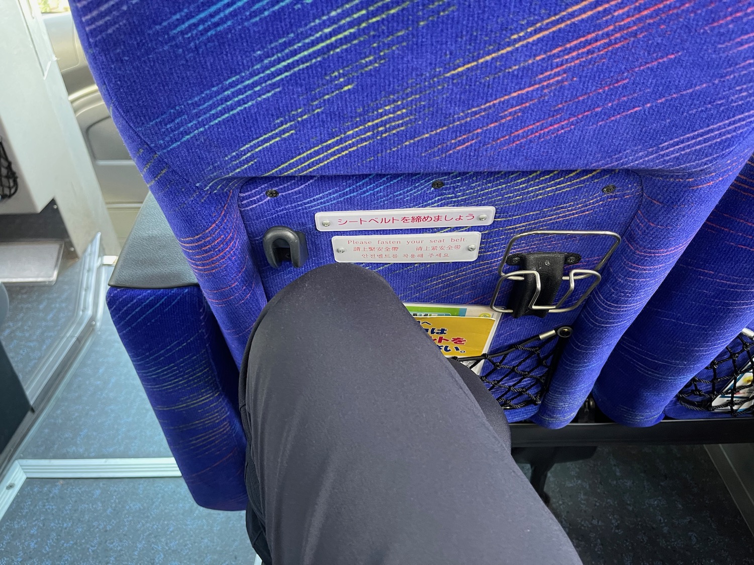 a blue seat with a blue and yellow pattern