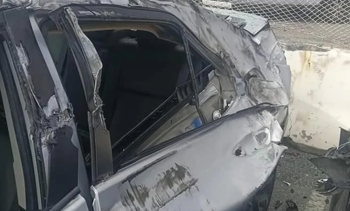 a damaged car with a broken window