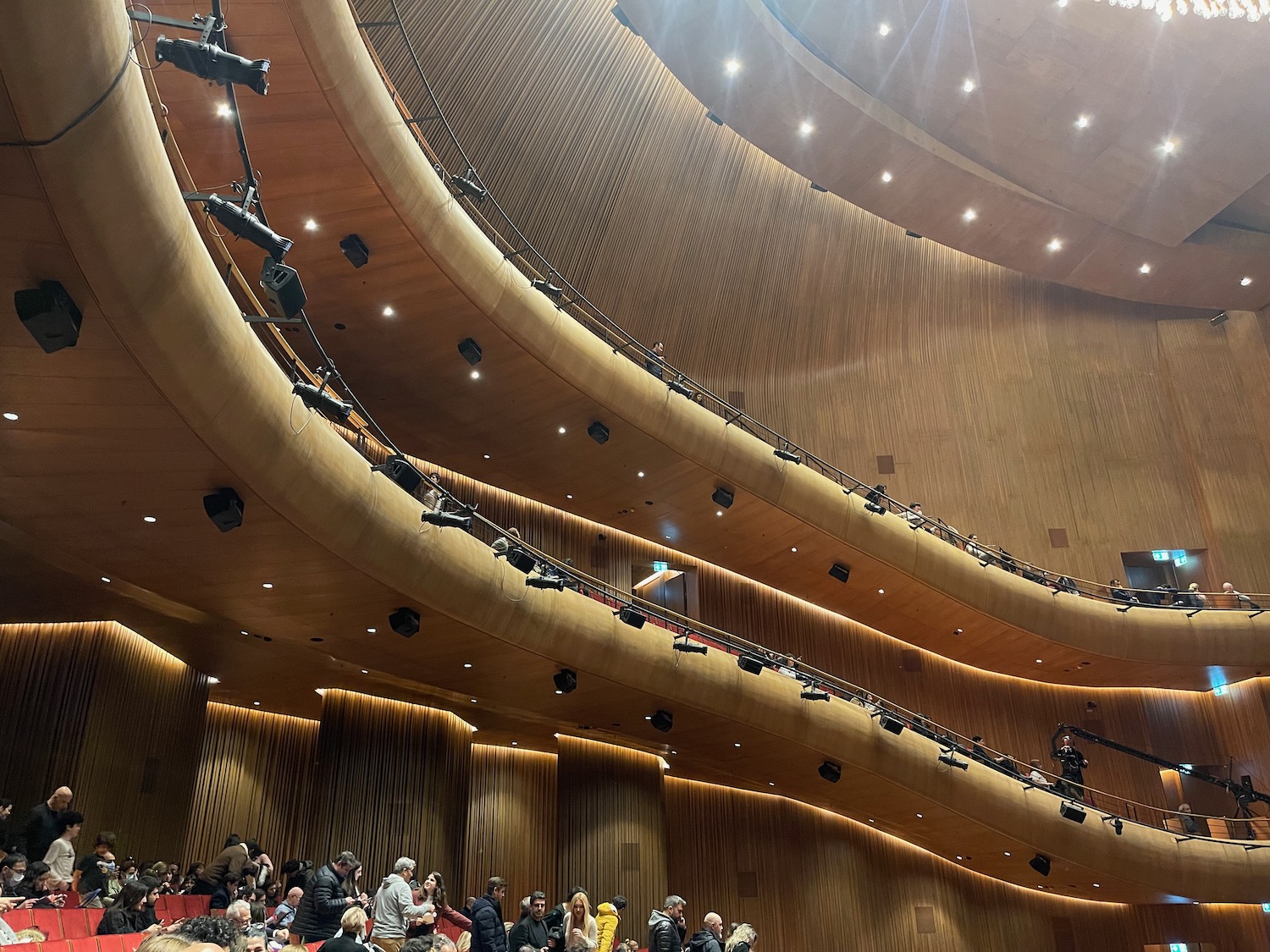 a large room with a large crowd of people